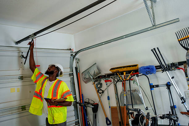 Professional Garage Door Panel Replacement technician working in Moreland, ID